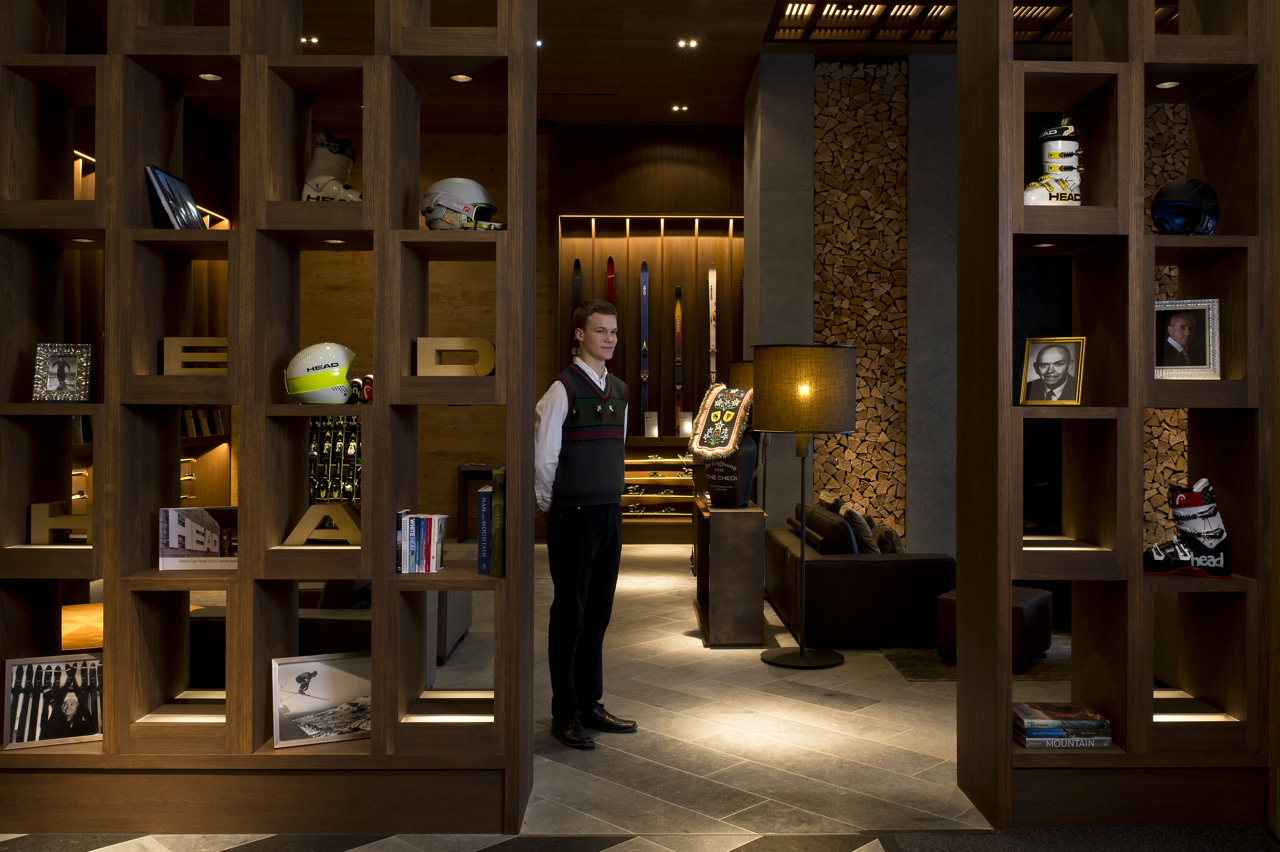The personal butler at the entrance to The Living Room in The Chedi Andermatt hotel